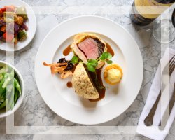 ¡Disfrute de una sabrosa comida en nuestro galardonado Mabel Crawford's Bistro!